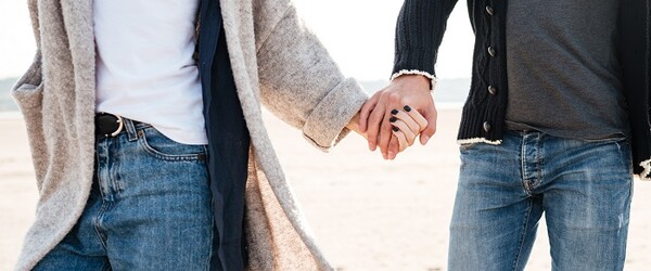 graphicstock-cropped-image-of-a-casual-couple-walking-and-holding-hands-outdoors_bun4a_8hl.jpg